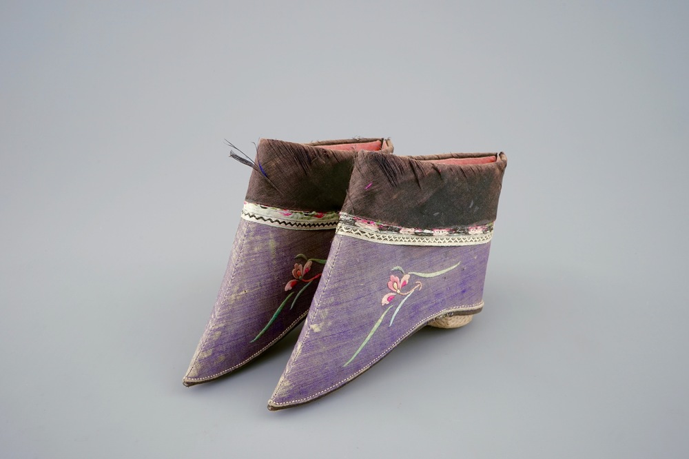 A pair of Chinese embroidered lotus shoes, 19/20th C.