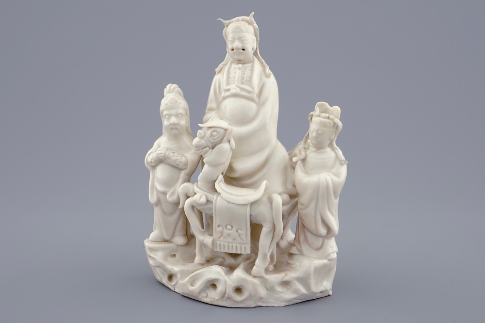 A Chinese Dehua blanc de Chine group of Wen Chang with 2 followers, 18/19th C.