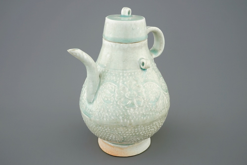 A Chinese qingbai moulded jug and cover, Southern Song Dynasty (1127-1279)