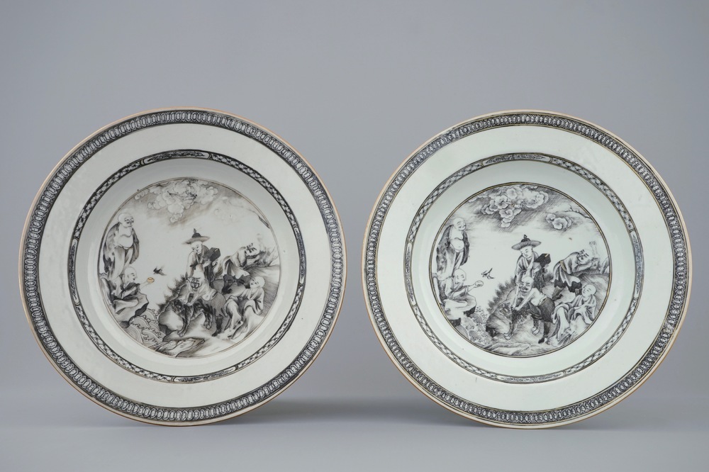 An unusual pair of Chinese grisaille plates with immortals with a tiger, Qianlong, 18th C.