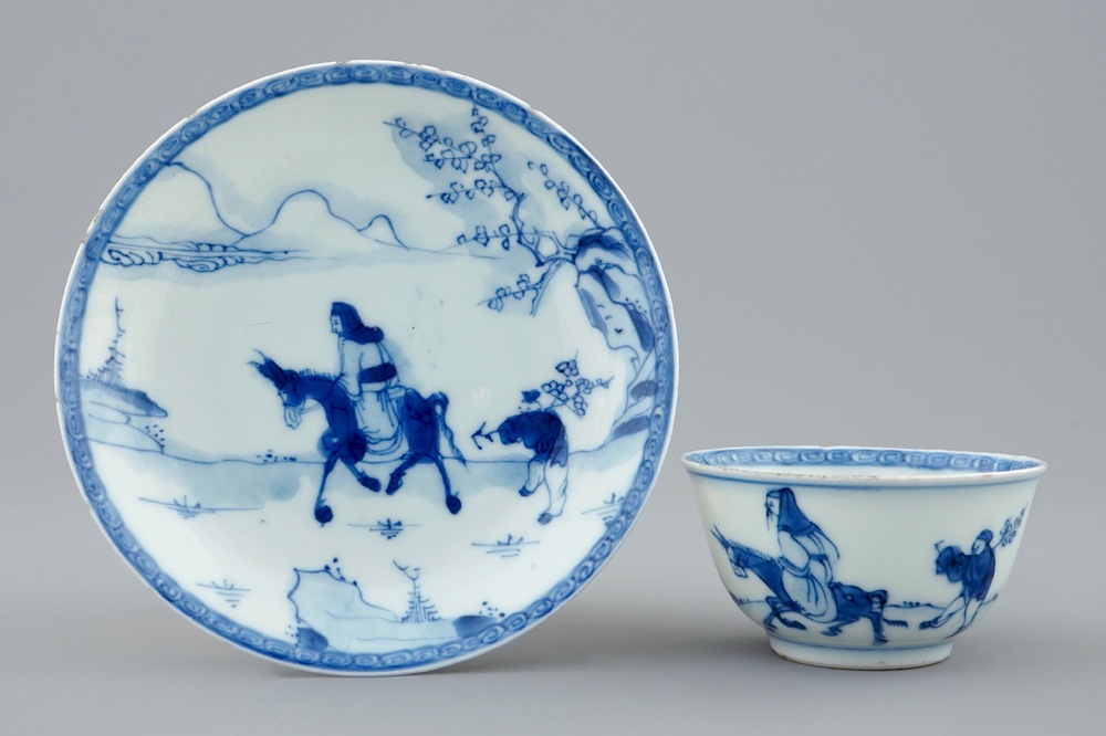 A blue and white Chinese cup and saucer with a sage on a donkey, Kangxi