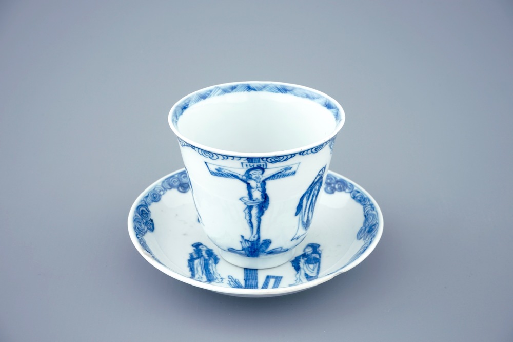 A blue and white Chinese cup and saucer with &quot;The crucifixion&quot;, Kangxi