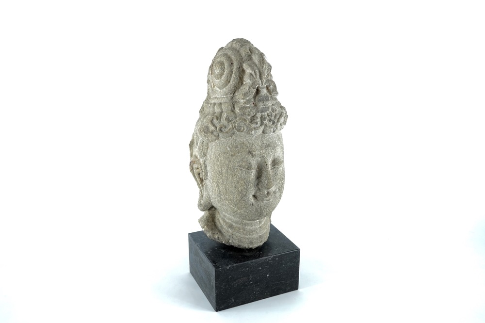 A Sino-Tibetan carved stone head of Guanyin