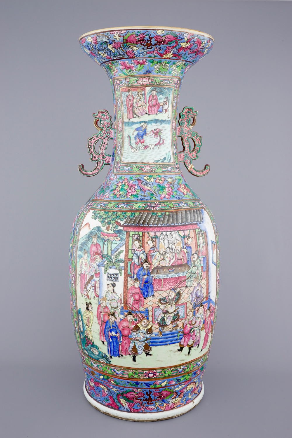 A massive Chinese famille rose on blue ground vase with a court scene, 19th C.