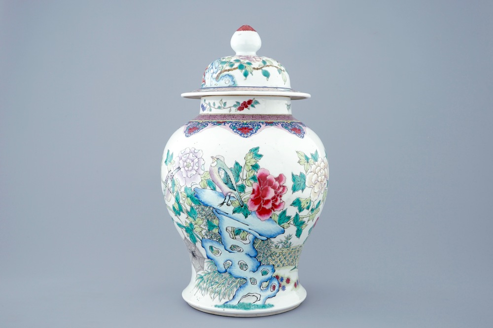 A fine Chinese famille rose vase and cover with birds among flowers, 19th C.