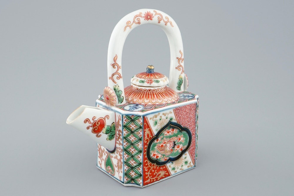A Japanese Imari arch-handled teapot and cover, 18th C.