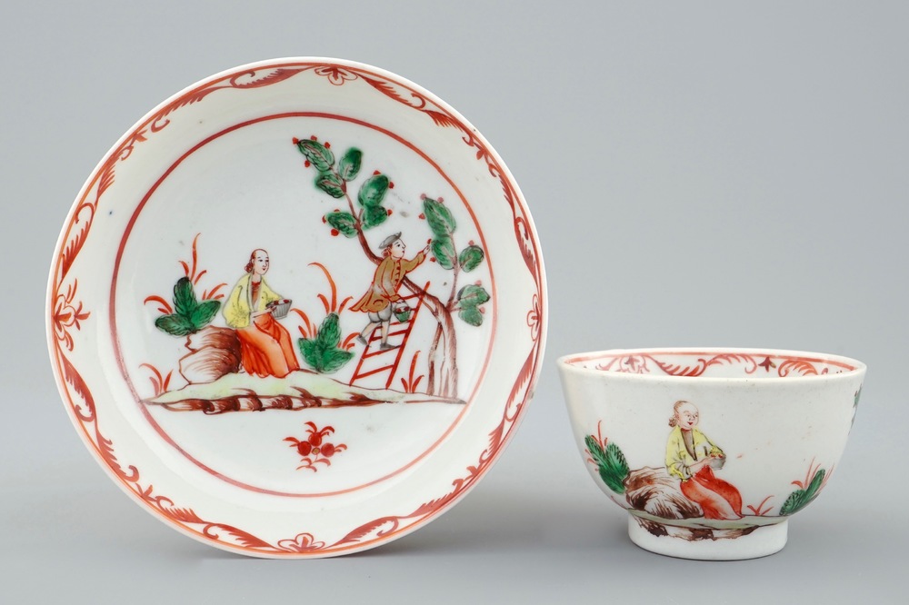 A Chinese European subject cup and saucer with cherry pickers, Qianlong, 18th C.