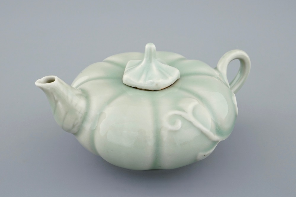 A Chinese celadon-glazed pumpkin shaped teapot and cover, 19/20th C.