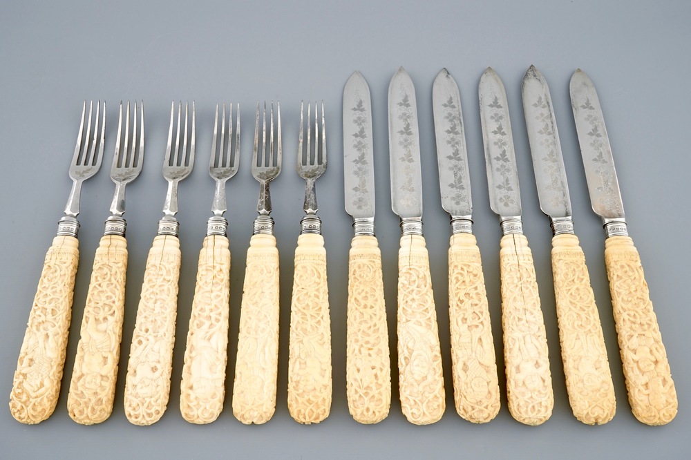 A set of 6 English silver knives and forks with Anglo-Indian ivory carved handles, 19th C.