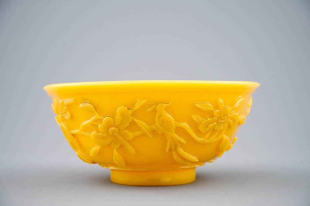 A Chinese carved yellow Beijing glass bowl, 19th C.