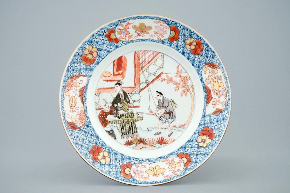 A Chinese iron red, grisaille and gilt plate depicting basket weavers, Yongzheng, 1723-1735