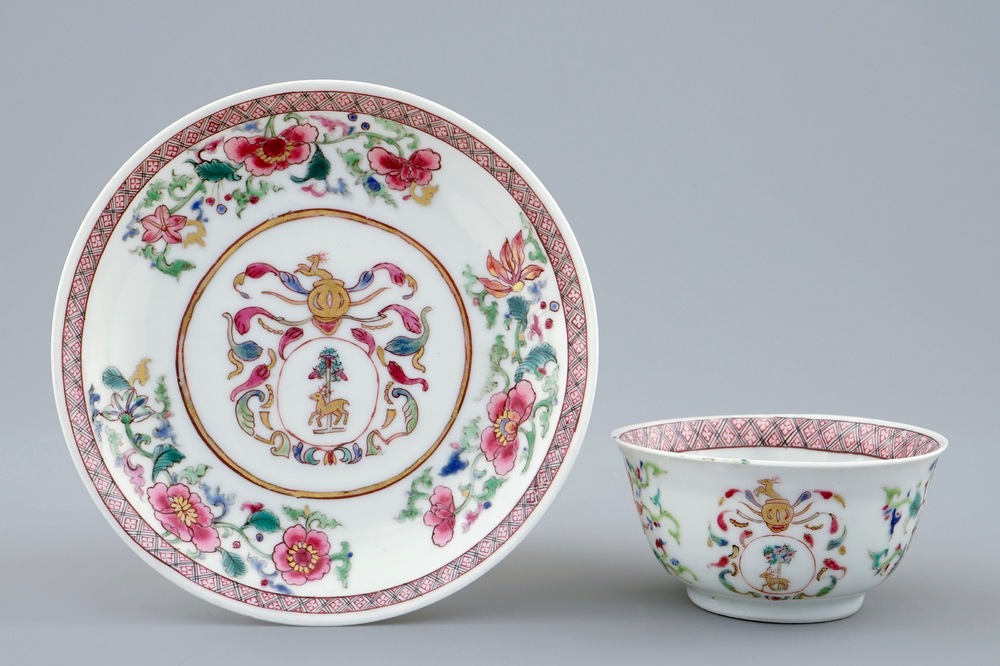 A Chinese famille rose armorial cup and saucer for the Dutch market, Yongzheng/Qianlong