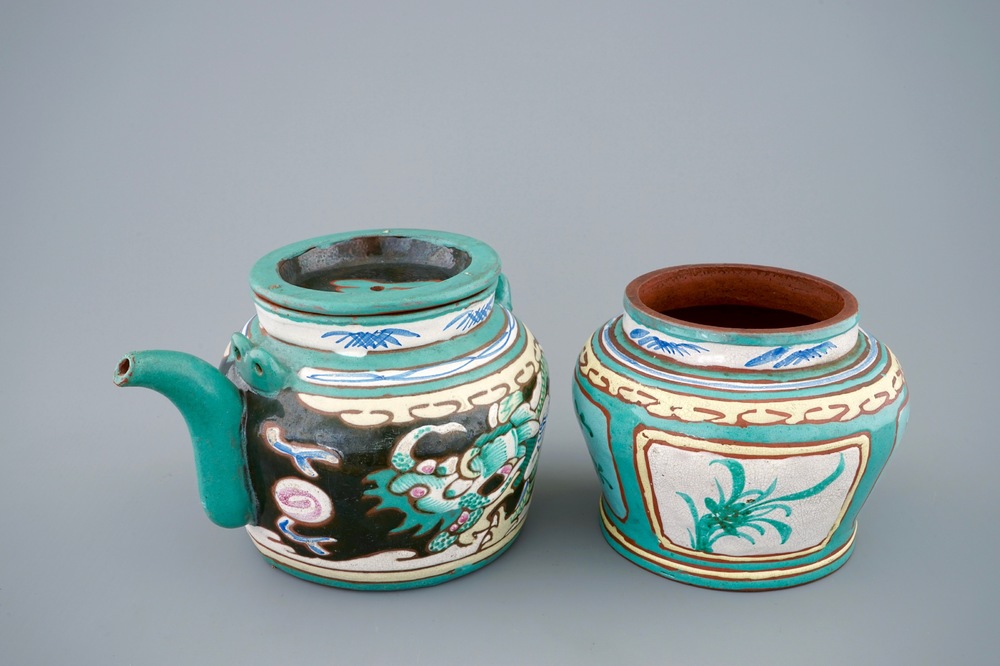 A Chinese enamelled Yixing teapot and cover with a small storage jar, 19th C.