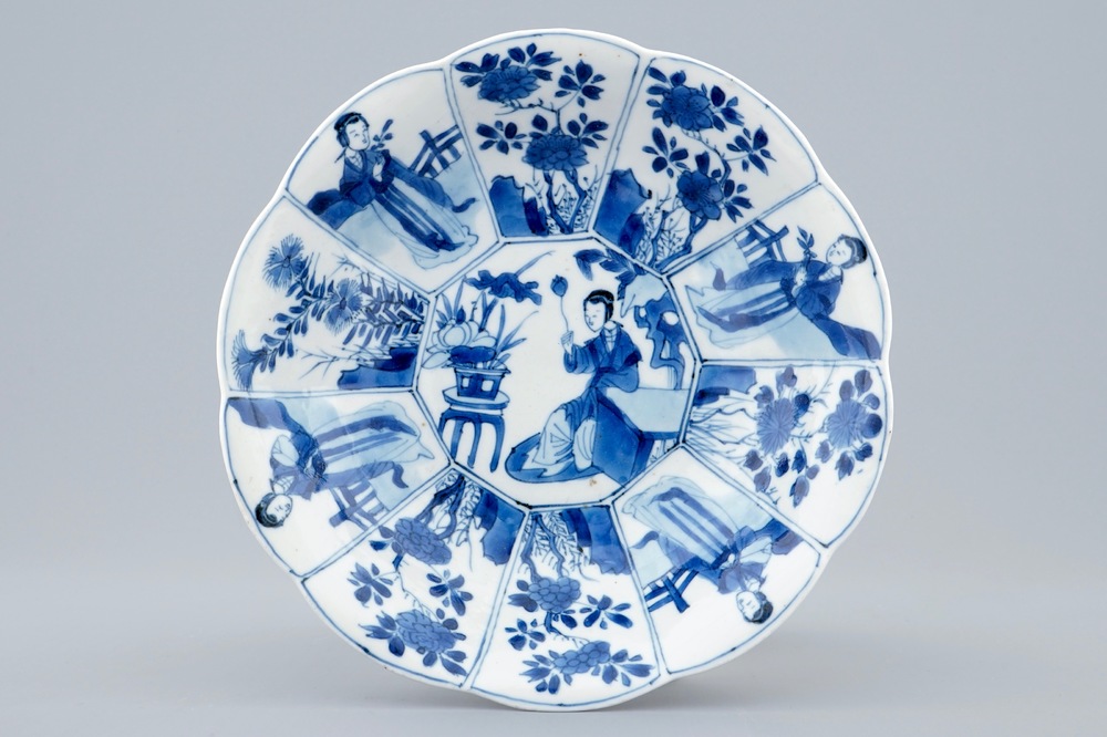 A Chinese blue and white moulded plate with long Eliza, Kangxi