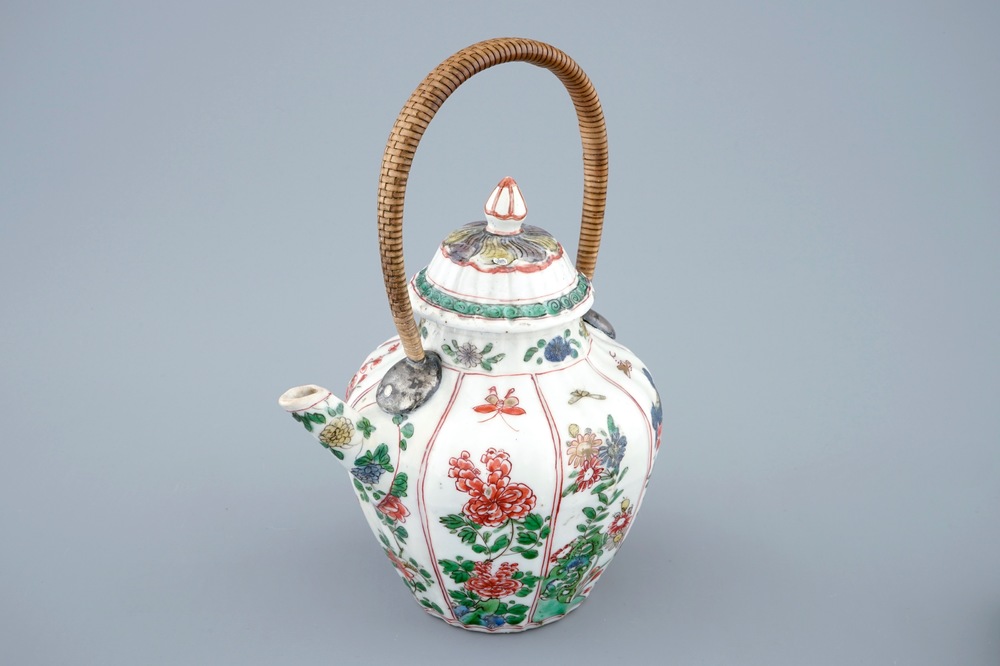 A Chinese famille verte teapot and cover with replacement handle, Kangxi