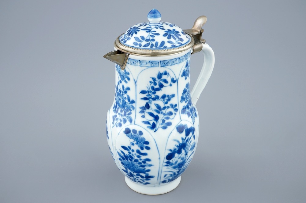 A Chinese blue and white jug and cover, Kangxi