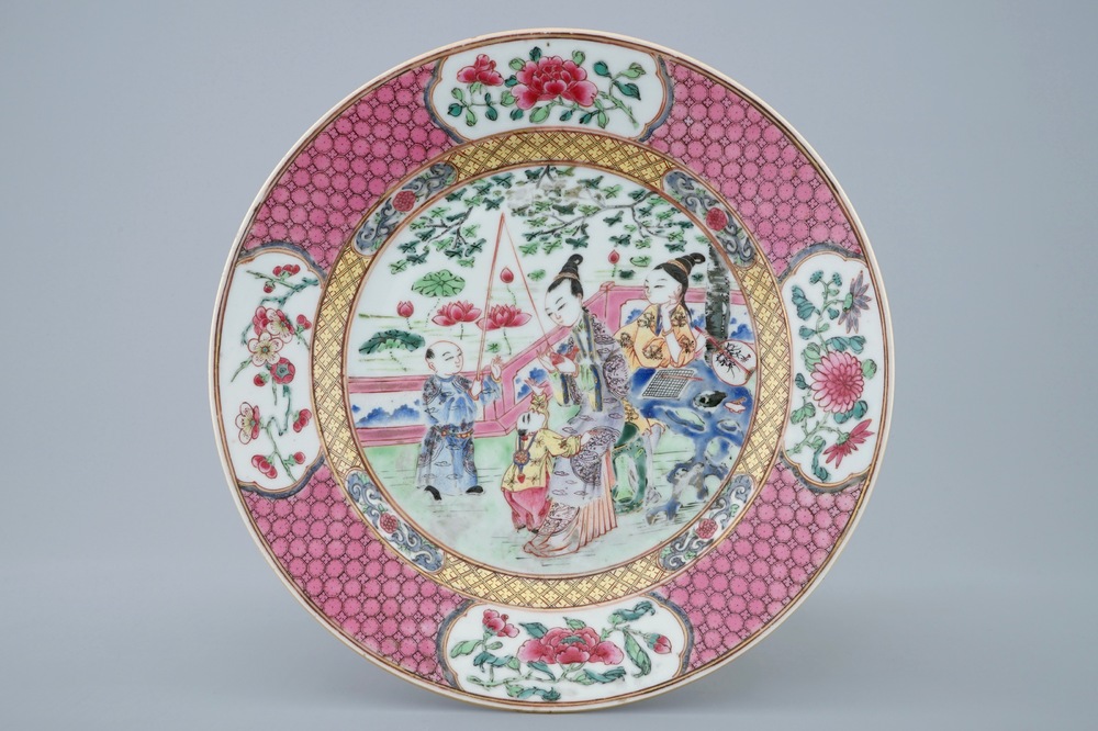 A Chinese famille rose plate with figures in a garden, Yongzheng, 1723-1735