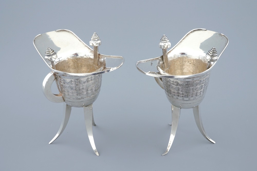 A pair of Chinese silver archaic &quot;Jue&quot; wine cups marked for Heng Li, Tientsin, 19th C.