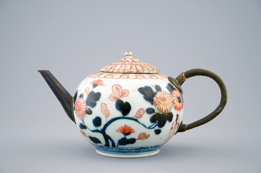 A Japanese Imari teapot and cover with replaced spout and handle, 18th C.