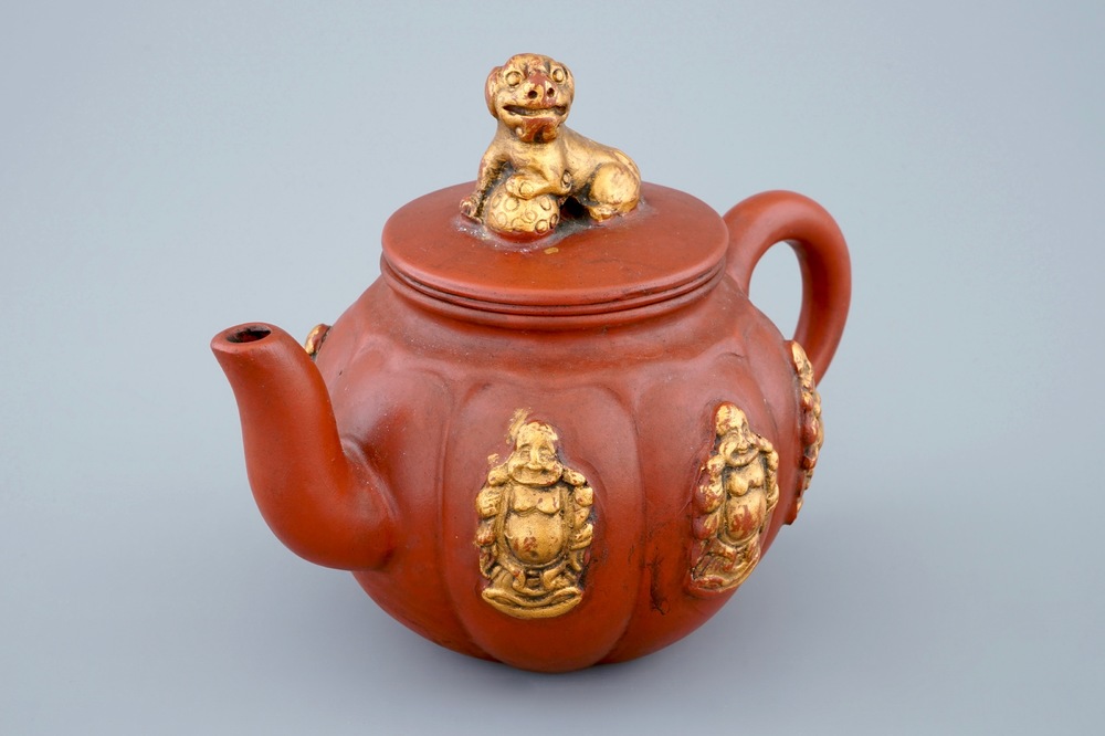 A Chinese parcel-gilt Yixing teapot and cover, 19/20th C.