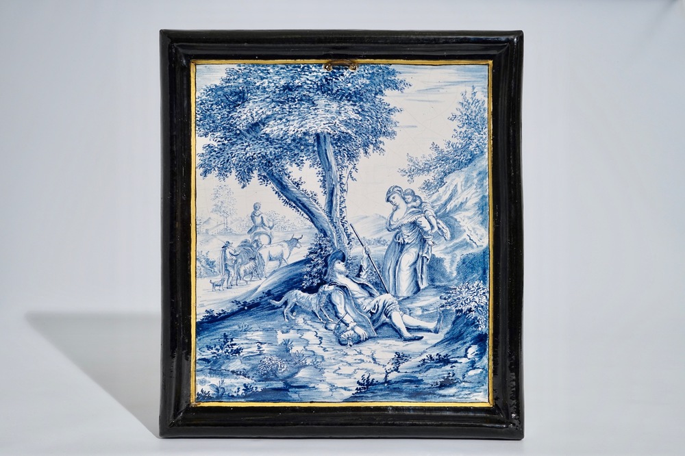 Une grande plaque rectangulaire en fa&iuml;ence de Delft au cadre en Delft noir, 18&egrave;me