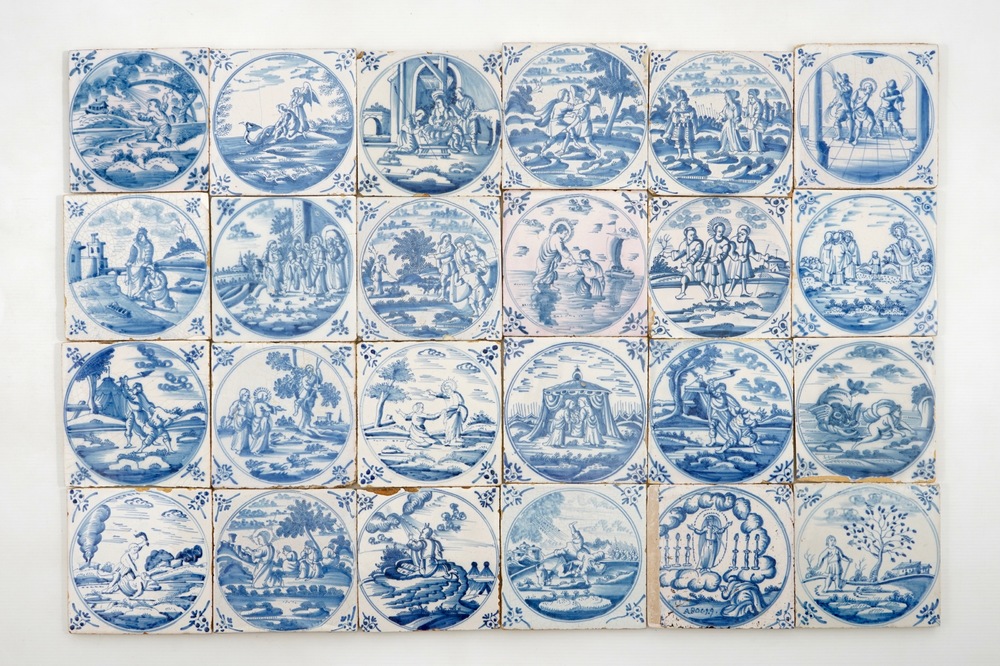 A set of 24 Dutch Delft blue and white biblical tiles, 18th C.