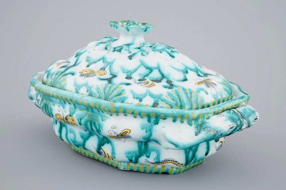 A Brussels faience tureen and cover with butterflies and caterpillars, 18th C.