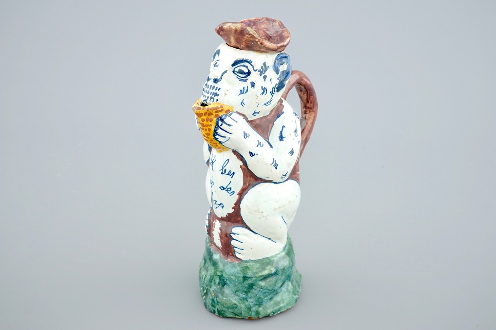 A polychrome Dutch Delft monkey-shaped jug, 19th C.