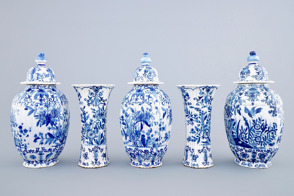 A blue and white five-piece garniture in Dutch Delft style, Samson, Paris, 19th C.