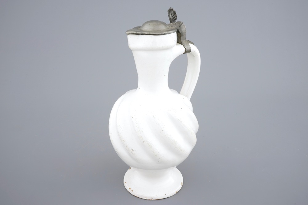 A white Dutch Delft pewter-mounted gadrooned jug, 17/18th C.