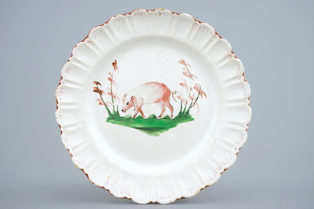 A plate with a pig in French fa&iuml;ence de l&rsquo;Est, 18th C.