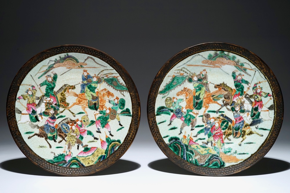 A pair of large Chinese Nanking famille rose warrior chargers, 19th C.