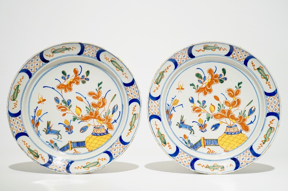 A pair of Dutch Delft polychrome dishes with hares and flowers, 18th C.