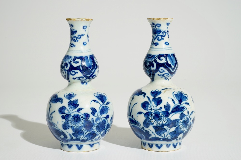 A pair of Dutch Delft blue and white double gourd vases, 1st quarter 18th C.