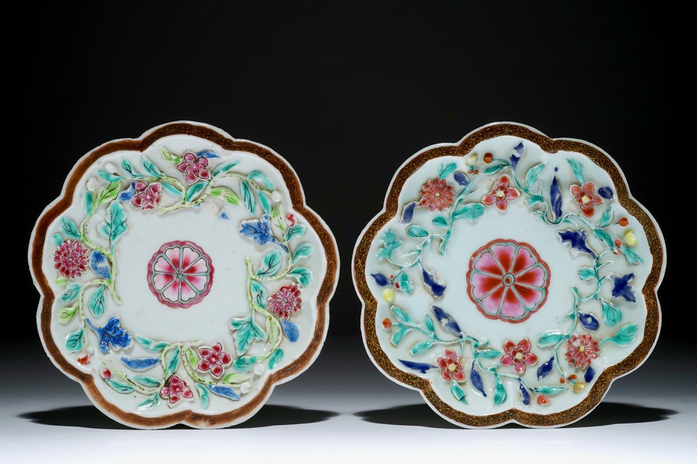 A pair of Chinese famille rose relief-decorated teapot stands, Yongzheng