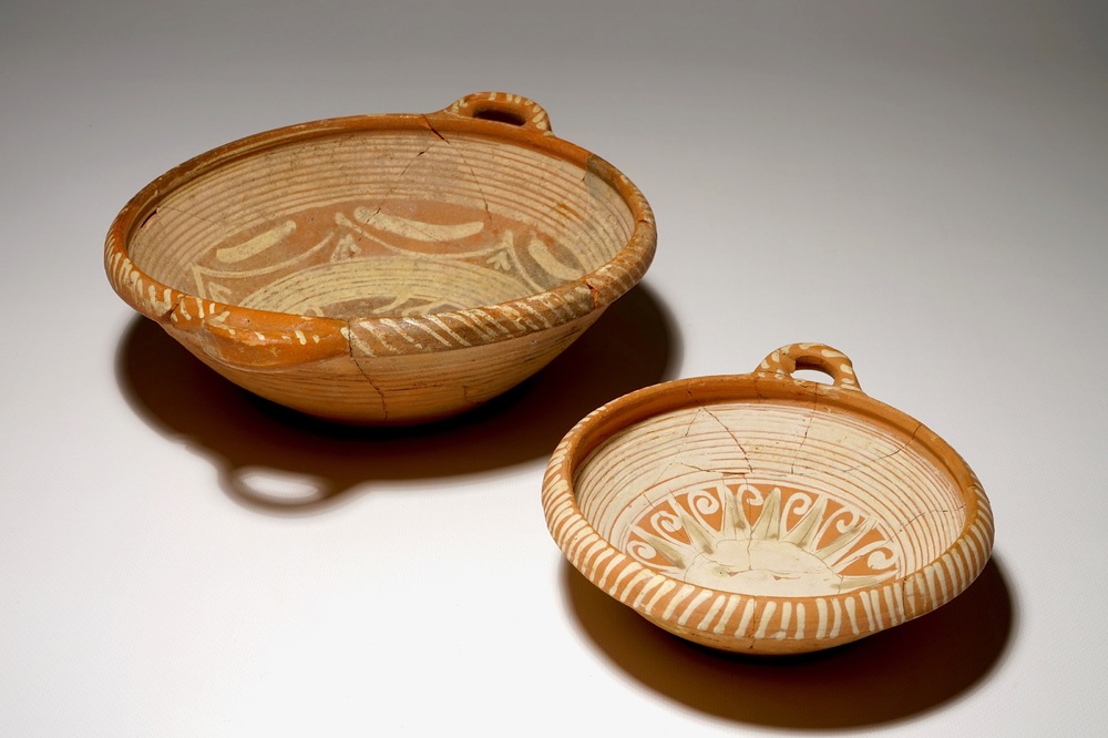 Two Werra red earthenware pottery porringers with a sun and a porcupine, dated 1607