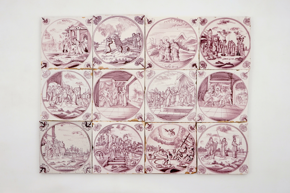 Un lot de 12 carreaux religieux en fa&iuml;ence de Delft mangan&egrave;se avec oeillets, 18&egrave;me