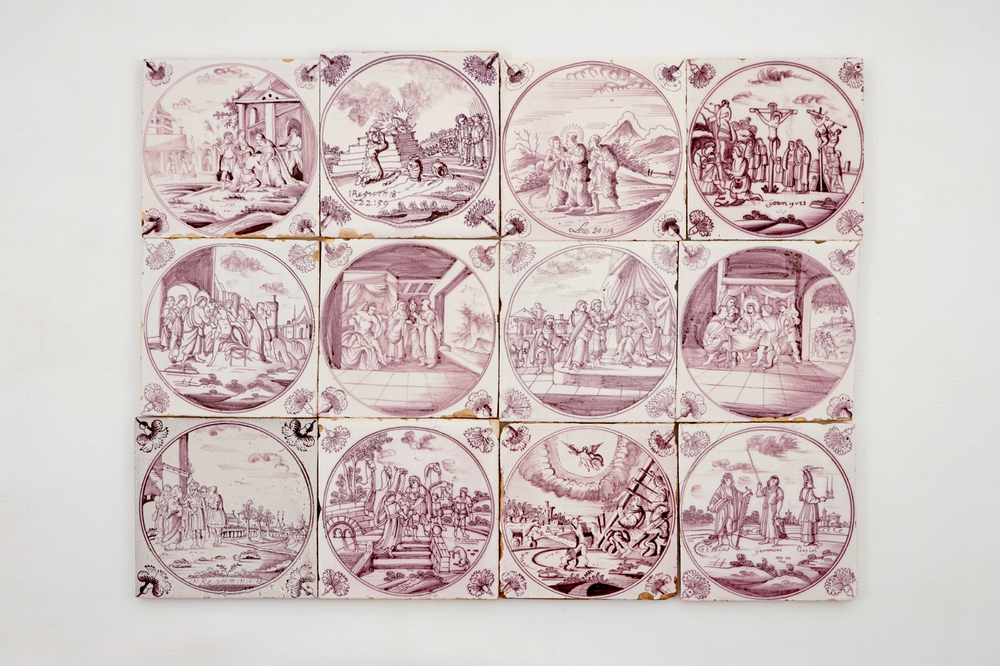 A set of 12 manganese Dutch Delft biblical tiles with carnation corners, 18th C.