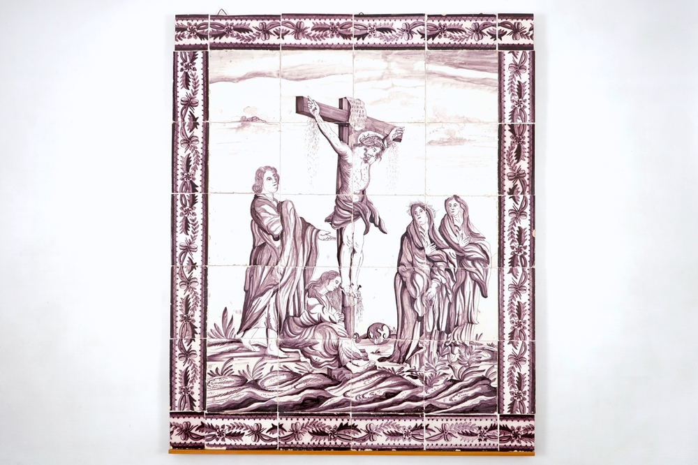A manganese Dutch Delft 20 tile panel with Christ on the cross, late 18th C.
