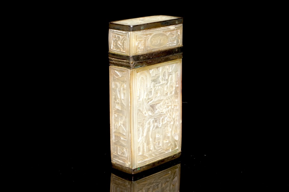 A Chinese mother of pearl cigarette box with relief design, 19th C.