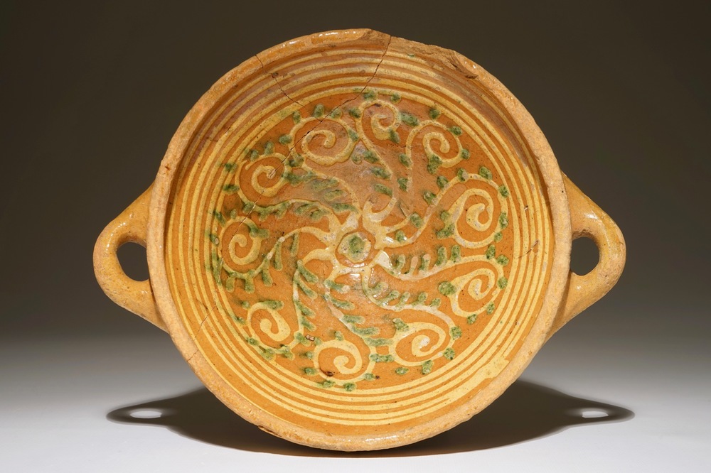 A large earthenware porringer, Northern Netherlands, early 17th C.