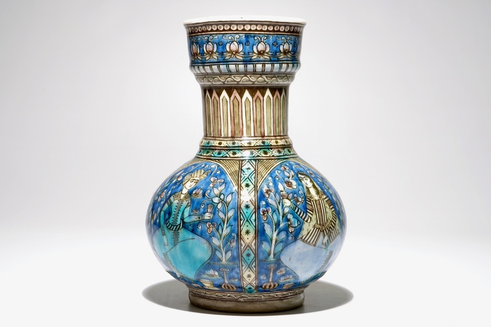 An Islamic Qajar pottery bottle-shaped vase, Iran, 19th C.