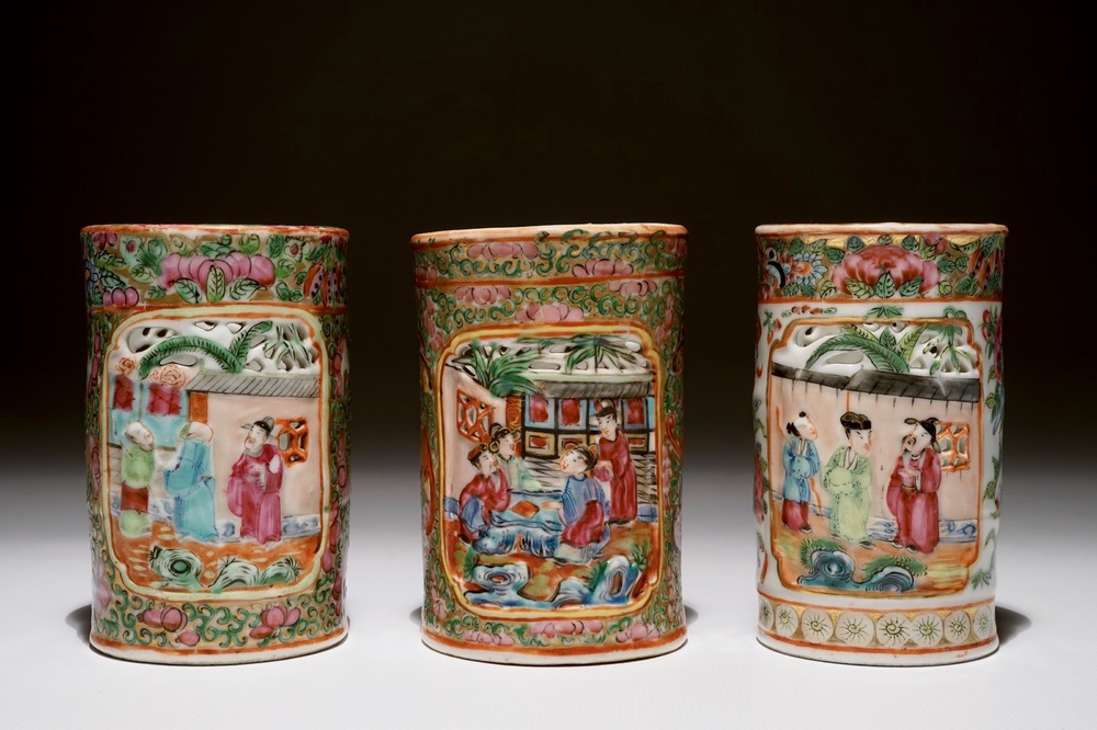 Three Chinese Canton rose medallion relief-decorated and pierced brushpots, 19th C.