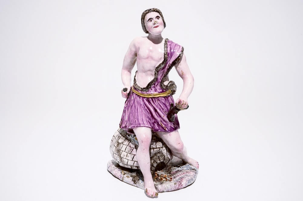 A tall French &quot;faience de l'Est&quot; figure, 18th C.