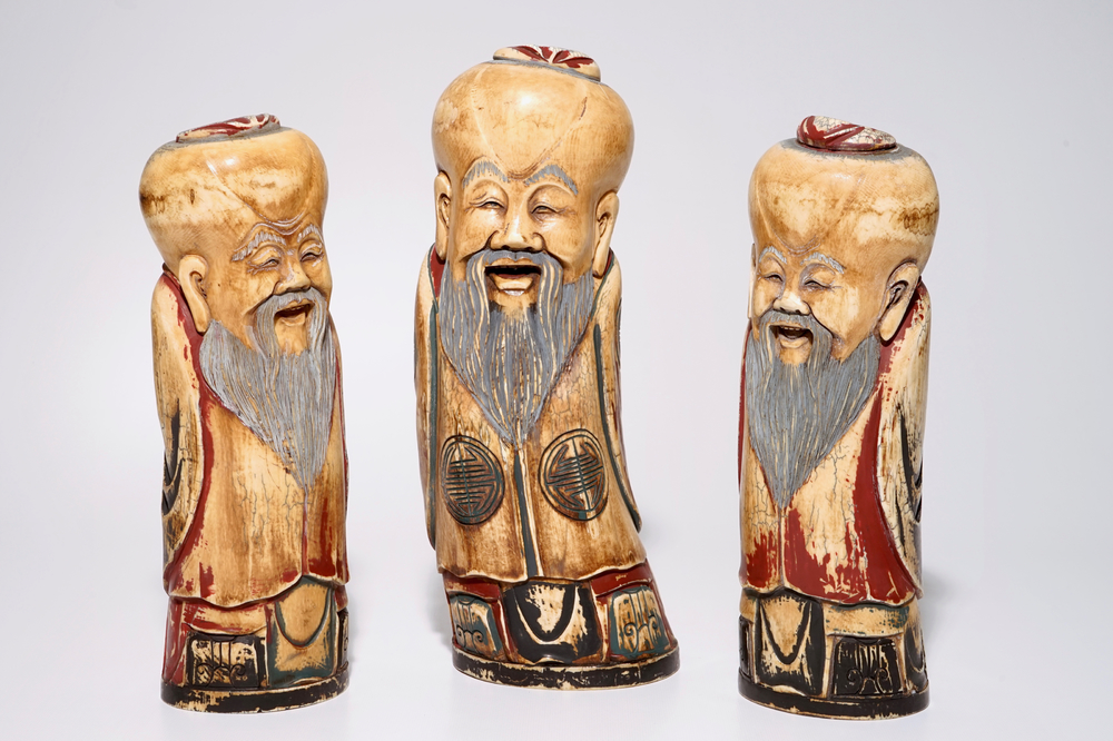 A set of three polychrome Chinese carved ivory figures of Shoulao, early 20th C.