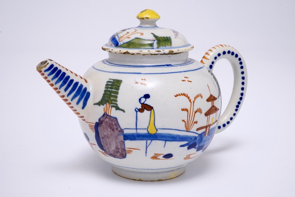 A polychrome Dutch Delft chinoiserie teapot and cover, 18th C.