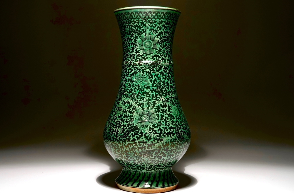 A rare Chinese verte-noire biscuit lotus scroll vase, Kangxi