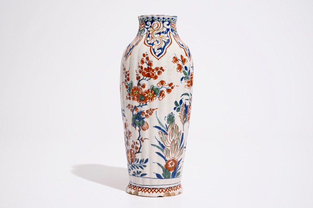 A gadrooned Dutch Delft cashmire palette vase with birds among flowers, ca. 1700