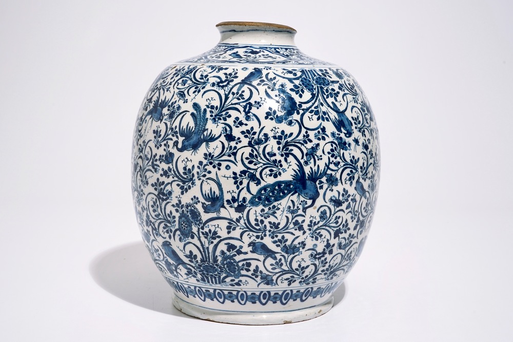 A Dutch Delft blue and white jar with peacocks among foliage, 17th C.