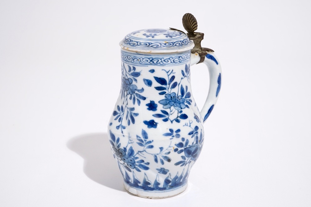 A twisted Chinese blue and white metal-mounted covered jug, Kangxi